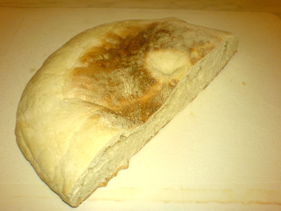 A traditional stottie cake stuffed with ham and yellow pease pudding.