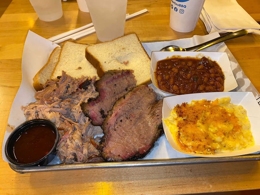 South Carolina style barbecue features mustard-based sauces and slow-smoked pork shoulder.