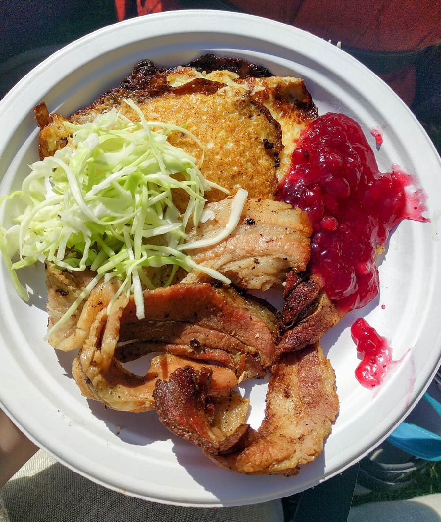 Traditional Östgötsk raggmunk with salted pork and lingonberry sauce.