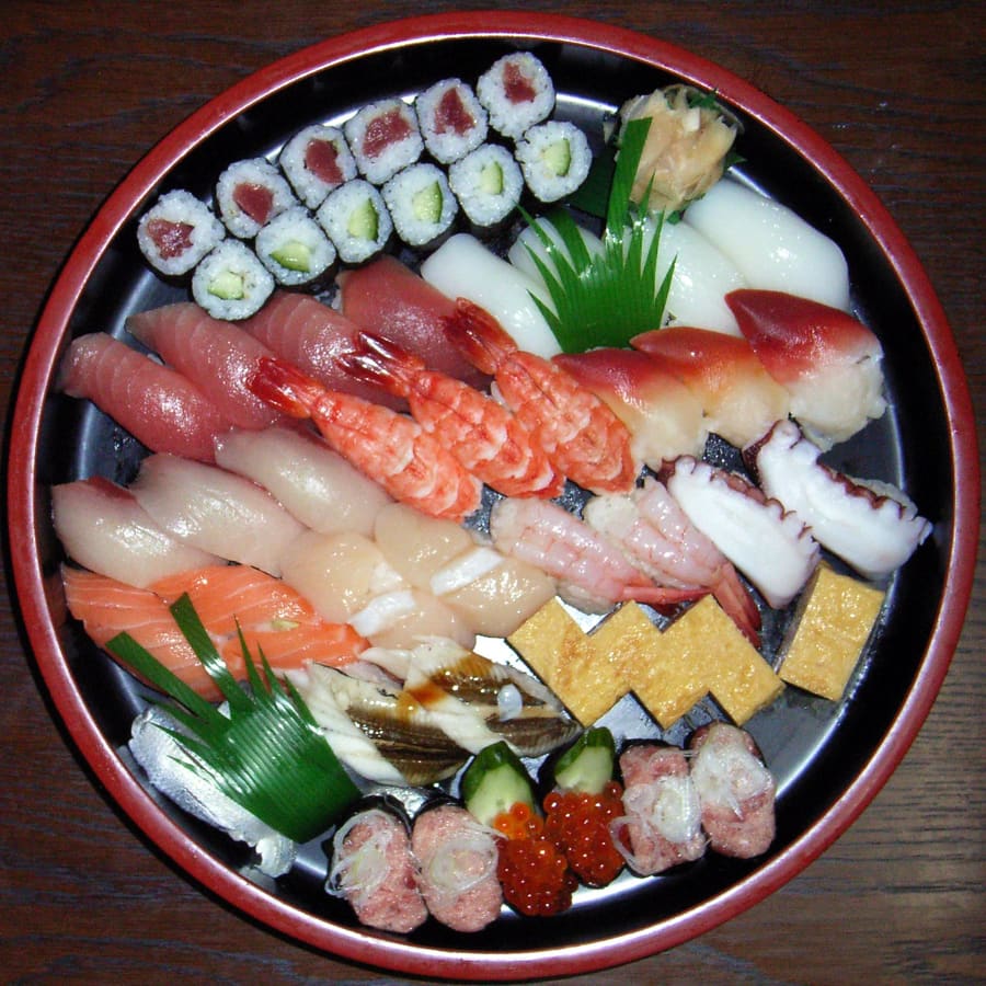 Fresh nigiri sushi featuring local Ishikari Bay catches on Sushiya-dori.