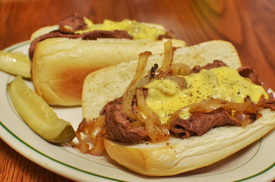 Order a cheesesteak 'whiz wit' to get sliced steak with Cheez Whiz and fried onions.