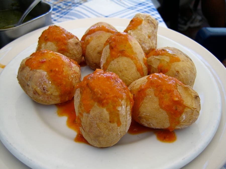 Papas arrugadas con mojo, a core Canarian side dish served across the island.