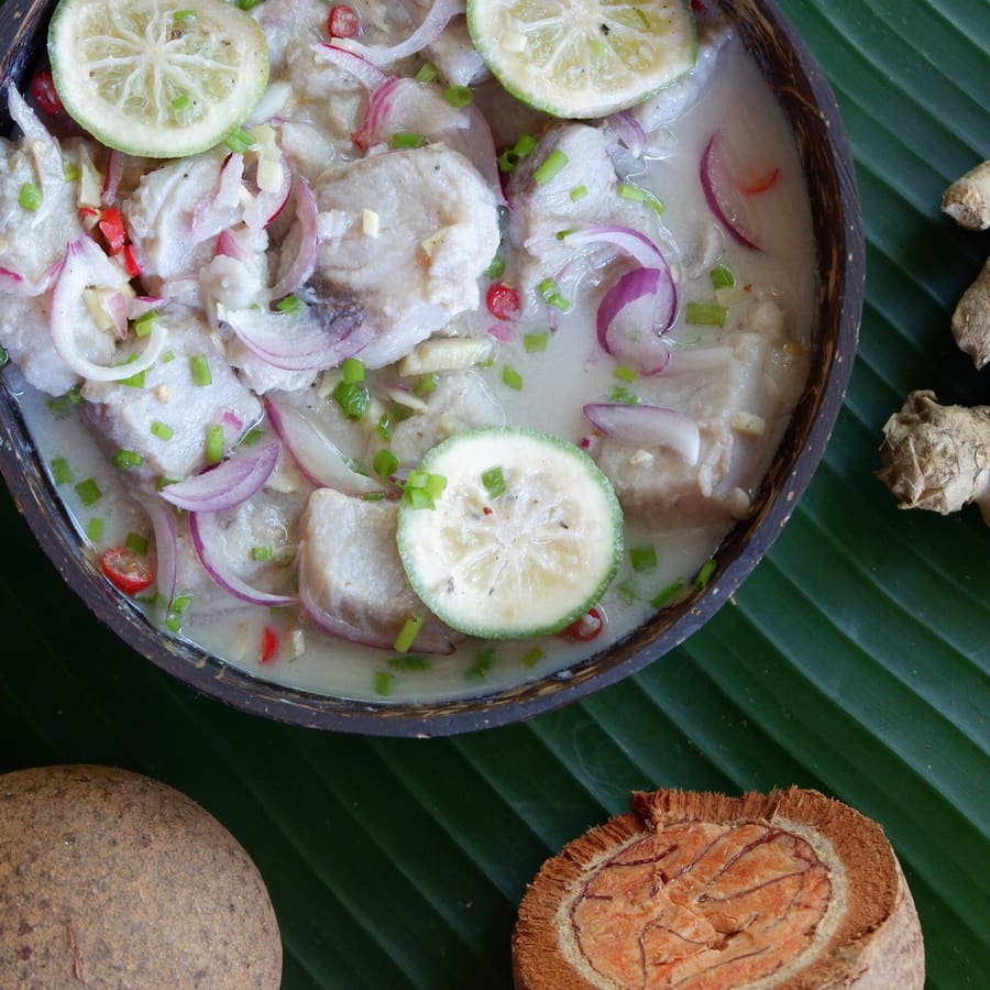 Tamilok woodworms harvested from mangrove wood, served raw with native vinegar, chili, and calamansi.