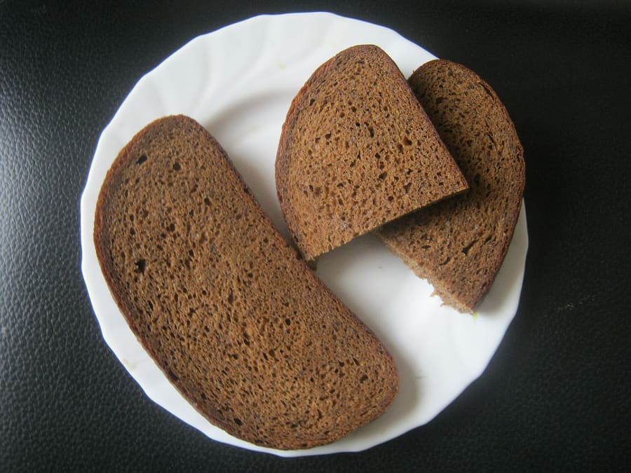 Rupjmaize, traditional sourdough dark rye bread, served across Rīga.