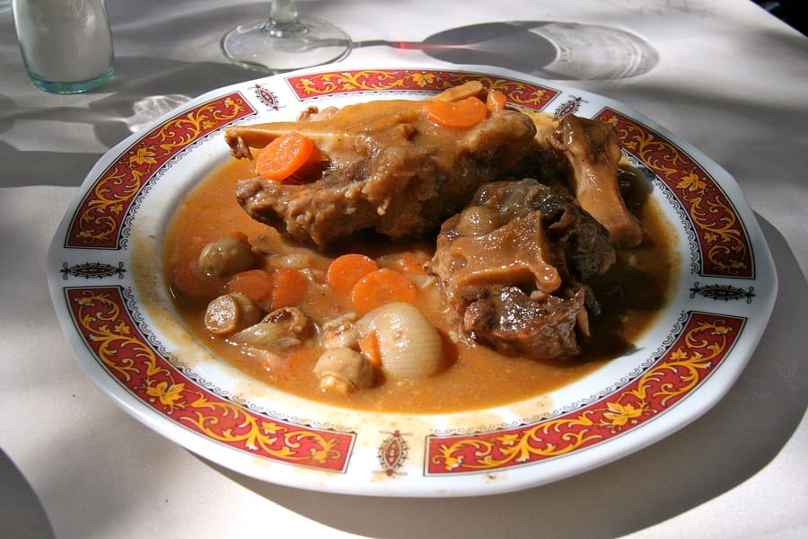 Rabo de toro served in traditional earthenware.