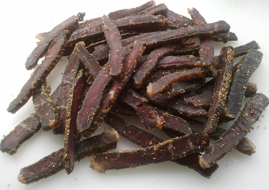 Local butcheries across Rustenburg cure beef biltong seasoned with coriander seed and coarse salt.