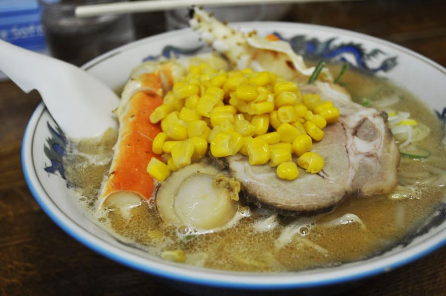 A hot bowl of Sapporo miso ramen served with pork belly and bamboo shoots.