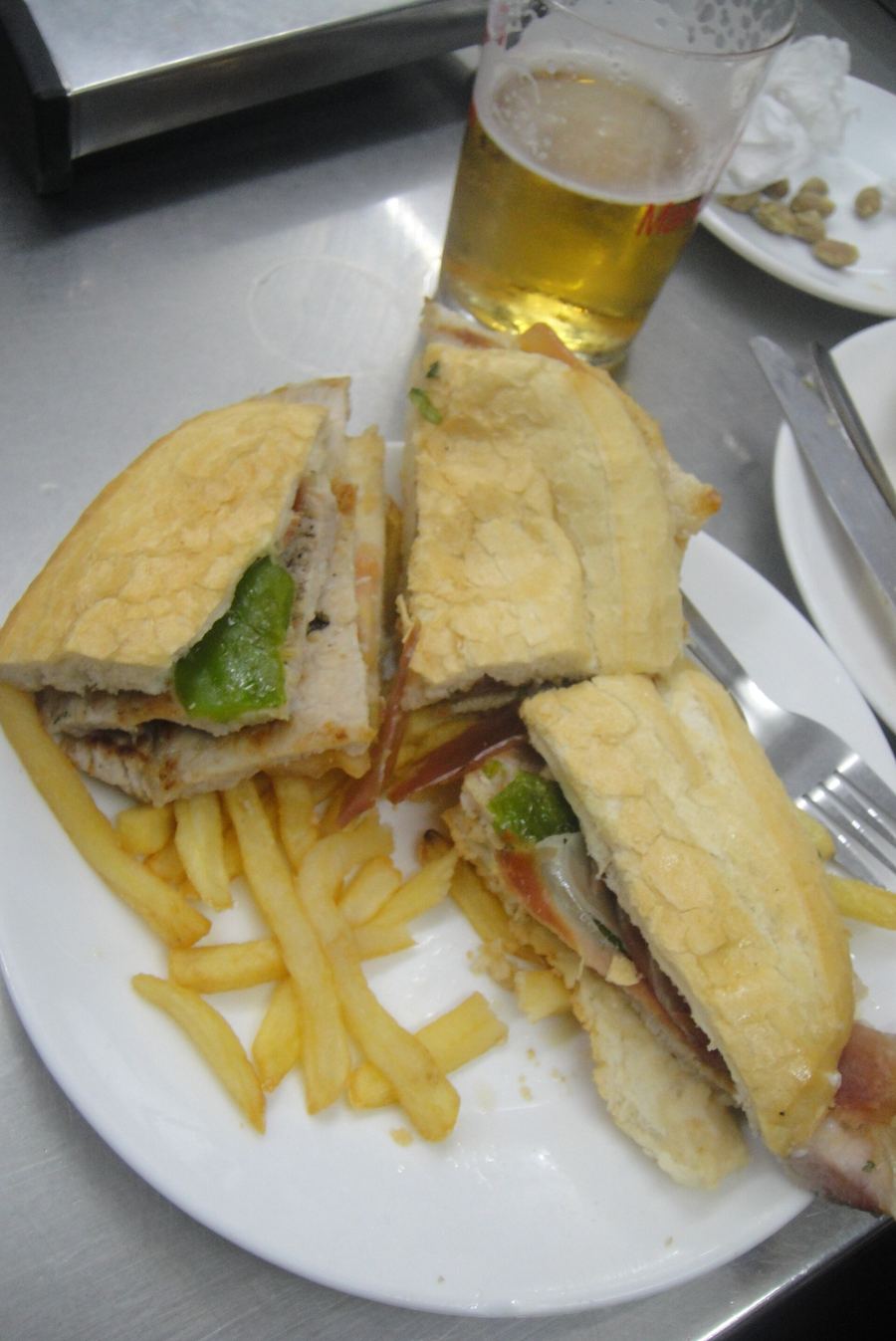 A traditional serranito sandwich served in a local taberna.