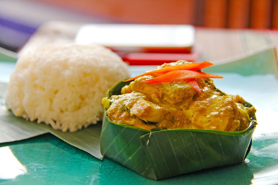 Fish amok, a coconut curry steamed in banana leaf, served at local restaurants.