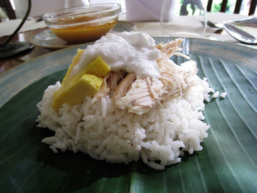 Nasi liwet served fresh on a folded banana leaf.