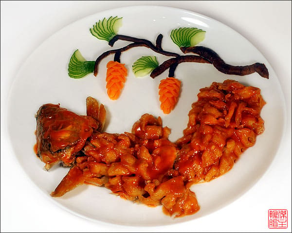 Squirrel-shaped mandarin fish, deep-fried and doused in sweet-and-sour plum sauce.