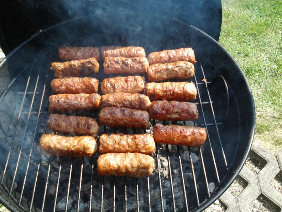 Traditional grilled pork dishes served with local condiments.